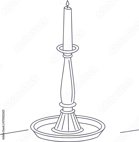 Elegant tall candle in a decorative holder for atmospheric lighting