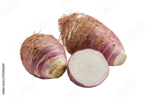 Two whole taro roots and one cross-section, showcasing their purplish-brown skin and white interior. background removed
