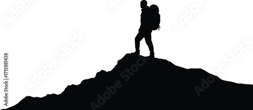 Solo Hiker Reaches Mountain Summit Against Bright Sky