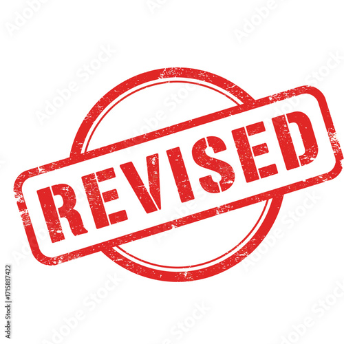 A red rubber stamp displaying the word revised in bold capital letters