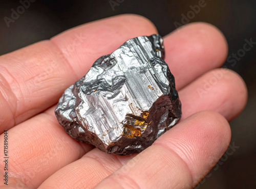Piece of Tin Ore in Hand