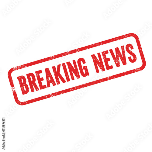 A red rubber stamp displaying the words breaking news on white background