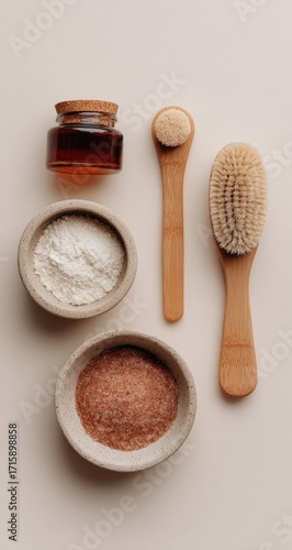 Natural skincare and body care items arranged on a light beige surface