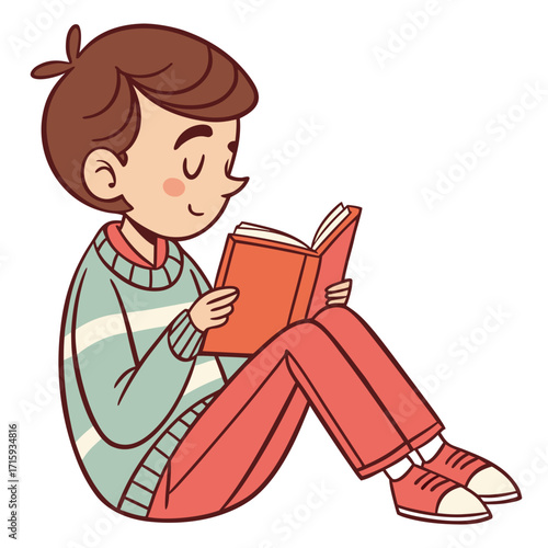 A young boy with brown hair wearing a striped sweater and red pants sits cross legged reading a book