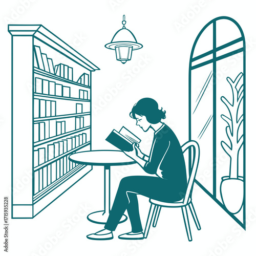 Woman reading a book at a table next to a bookshelf in a library or cafe