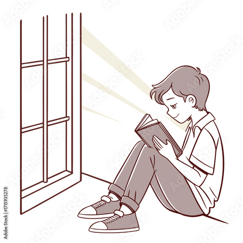 Young boy sitting by a window reading a book with light rays shining on him
