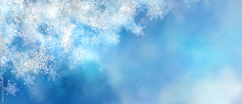 Obraz premium Close-up of frosty snowflakes with sunlight and blue sky background, winter nature scene, seasonal cold weather concept.