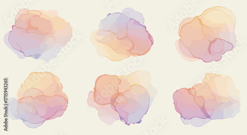 Watercolor ink blots in pastel tones on light background