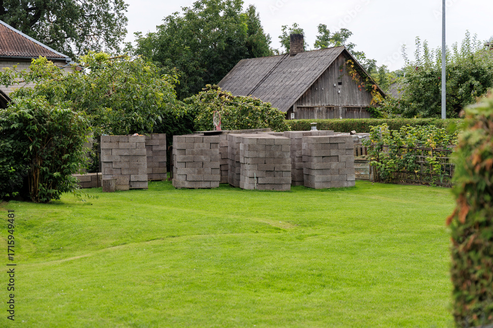 Fototapeta premium Stacks of Concrete Blocks in a Yard