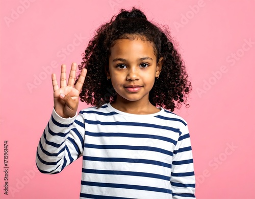 Young girl showing the number four
