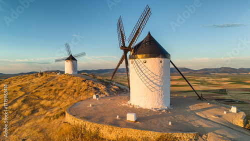 Aerial view of the historic windmills of Consuegra at sunrise, Castilla-La Mancha, Spain