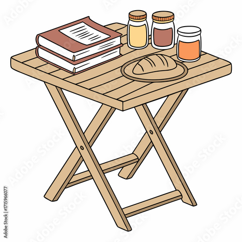 A wooden folding table set up outdoors with books bread and jars of preserves or jam
