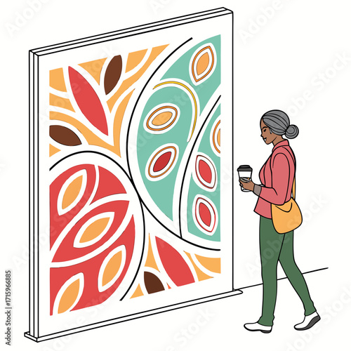Woman with coffee cup admiring a large abstract art installation with colorful geometric patterns