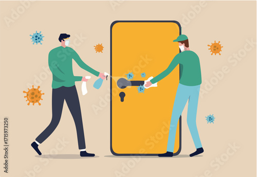 Cleaning or disinfect door handle to prevent Coronavirus COVID-19 outbreak concept, cleaning service workers spray disinfectant alcohol or sanitiser and using cloth to clean Coronavirus pathogens