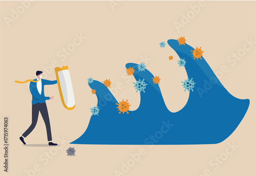 Business protection and immunity against COVID-19 Coronavirus second wave concept, bravely businessman leader holding strong shield to protect and control business from Coronavirus pathogen waves