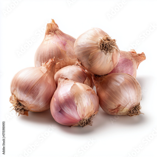 whole shallots on white background