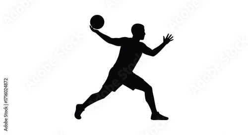 Silhouette of an athlete preparing to throw a ball with force
