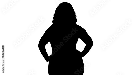 Confident woman with hands on hips projecting authority and strength, embodying empowerment and leadership for business or personal development themes.