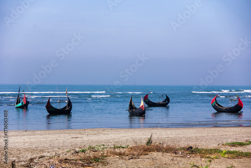 Cox’s Bazar Sea Beach in Bangladesh is the world’s longest natural sandy beach, stretching 120 km along the Bay of Bengal, famous for its golden sands, blue waters, and breathtaking sunsets