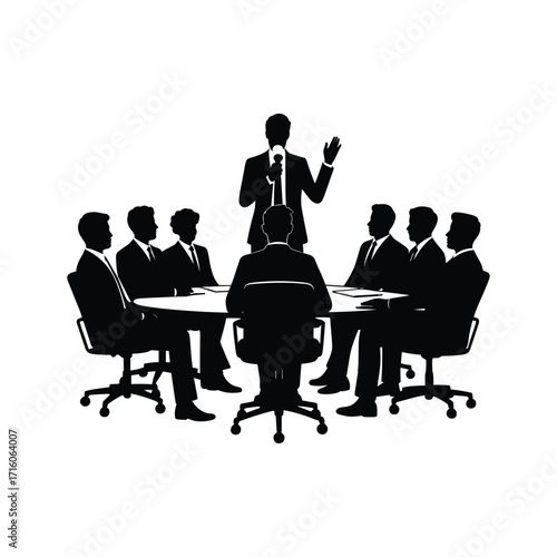 Team meeting in silhouette with leader presenting ideas at a round table discussion