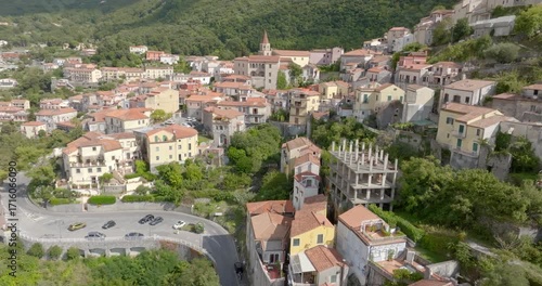 Panoramic aerial view of the town of Maratea, in the province of Potenza, Basilicata, Italy. It's a small village with a few houses perched on the mountain.