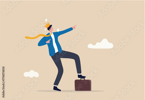 Success businessman king proudly of his achievement, work happiness or self esteem, freedom or entrepreneurship concept, cheerful businessman wearing king crown step on briefcase pointing to the sky. 
