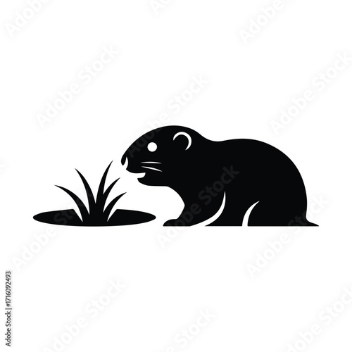 Silhouette of a charming beaver nibbling grass in a minimal black and white design