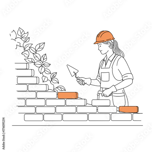 Female construction worker laying bricks with a trowel in a landscaping project
