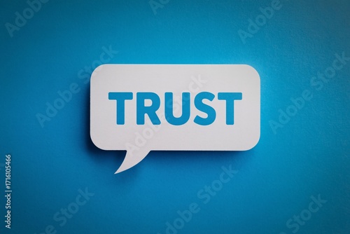 White speech bubble with trust text on blue background business communication concept message.