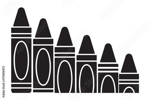 Black crayons in graduated row for education