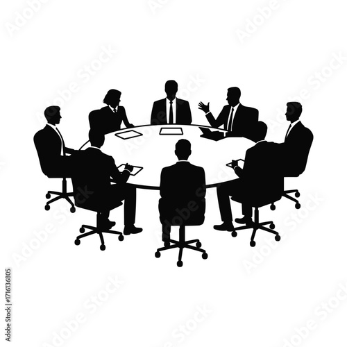 Diverse business team collaborating around a round meeting table discussing ideas