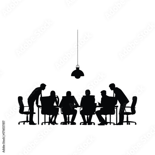Silhouettes of business people in a meeting room collaborating around a table with chairs and a pendant light.