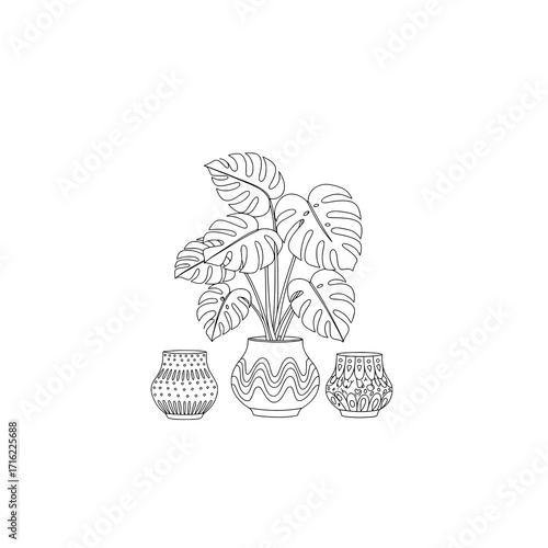 Stunning monstera plant in patterned pot adds modern elegance to any interior design project
