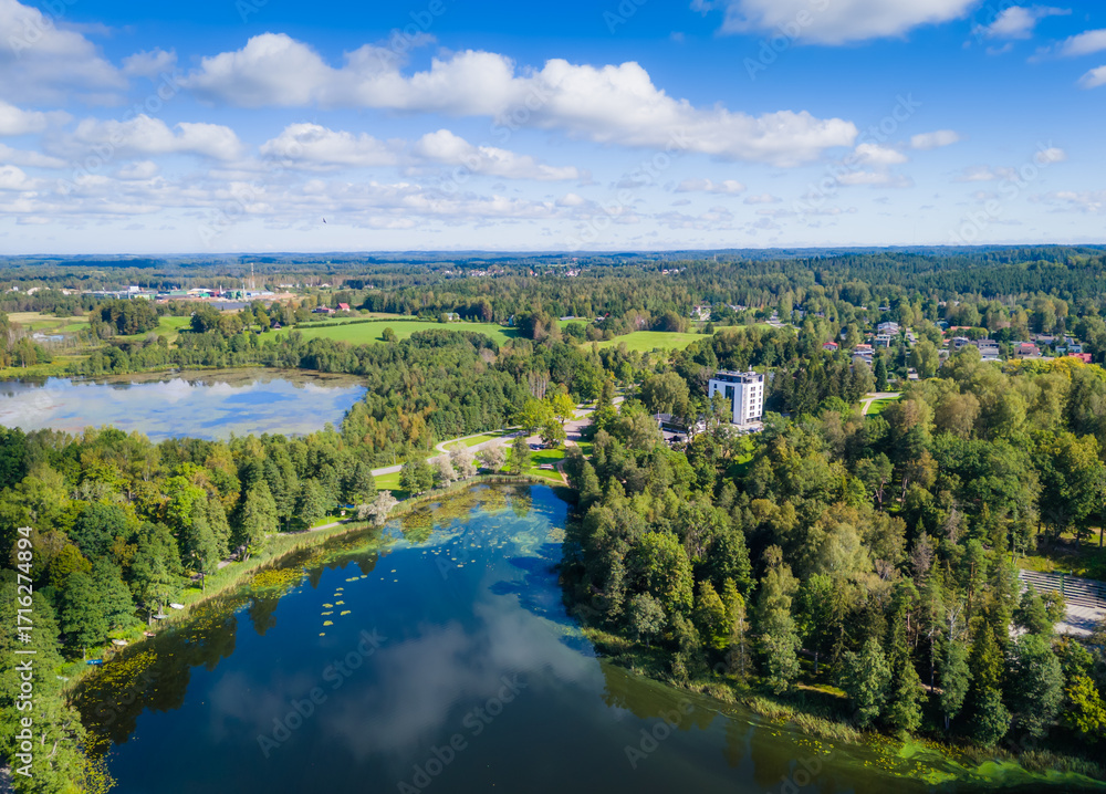 Fototapeta premium Puhajarve lake and GMP clubhotel. Estonian countryside landmark with lakes and islands. Aerial drone view of Puhajarv 