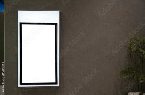 Blank billboard on wall.