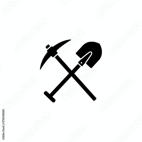 A black silhouette icon of a crossed pickaxe and shovel, representing mining, construction, and manual labor.