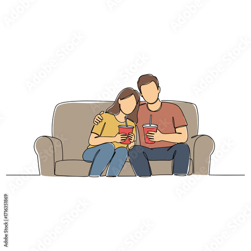 Couple sitting on sofa enjoying drinks while watching movie  