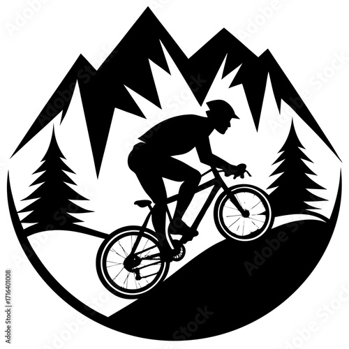 Black silhouette of a mountain biker riding downhill