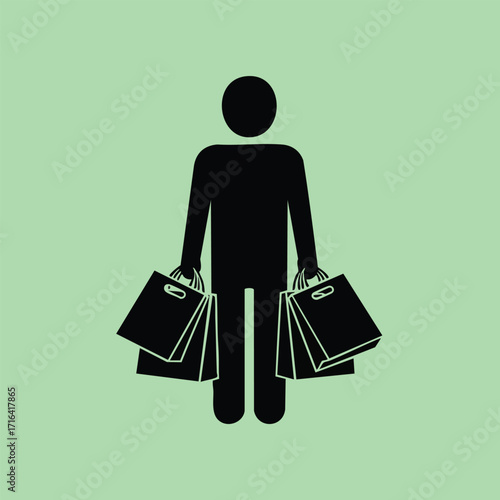Silhouette of a person carrying multiple shopping bags in both hands on a solid green background