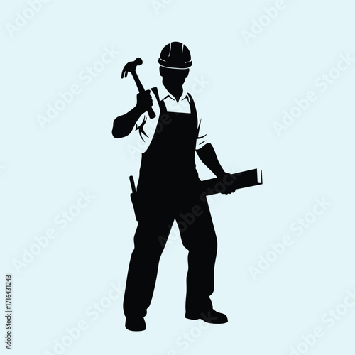 Silhouette of a construction worker holding a hammer and a wooden plank wearing safety helmet and overalls