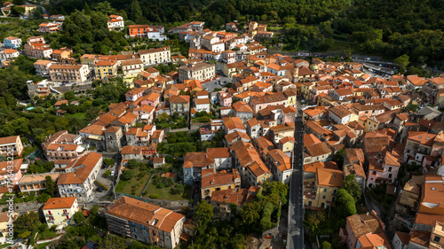 Fototapeta Naklejka Na Ścianę i Meble -  Aerial view of the town of Maratea, in the province of Potenza, Basilicata, Italy. It's a small village with many narrow streets and a few houses perched on the mountain.