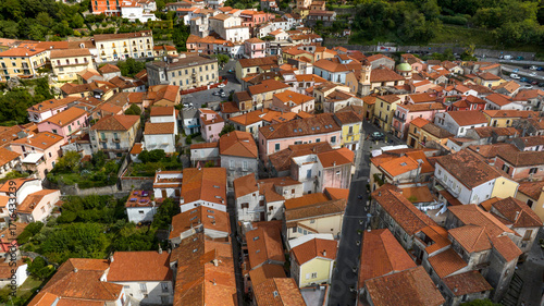 Fototapeta Naklejka Na Ścianę i Meble -  Aerial view of the town of Maratea, in the province of Potenza, Basilicata, Italy. It's a small village with many narrow streets and a few houses perched on the mountain.