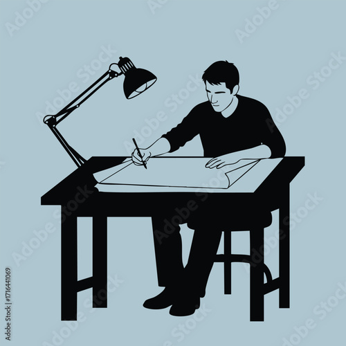Man sitting at a desk drawing architectural plans under a desk lamp in a focused creative workspace environment