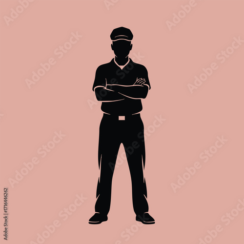 Silhouette of a confident man standing with arms crossed wearing a cap and casual clothing on a plain background