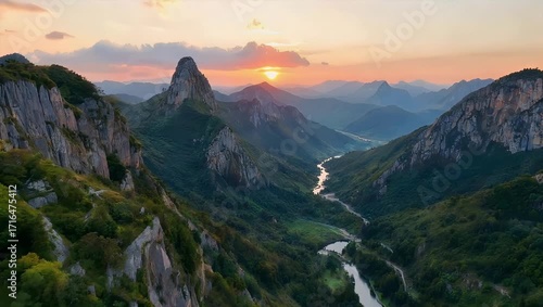 Serene Aerial Shot of Mountain Ranges with Evening Sunset Colors