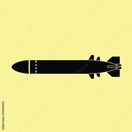 Black silhouette of a missile with fins on a pale yellow background representing military weaponry and defense technology