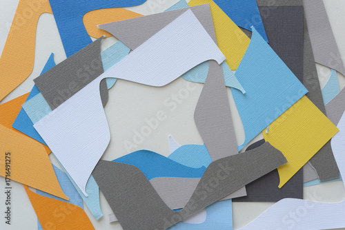 random machine-cut paper background with stencil pieces that once formed stars