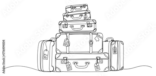 A Stack of Vintage Suitcases for a Grand Journey