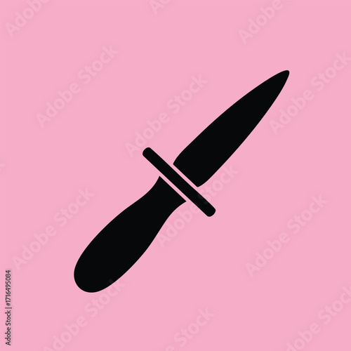 Black silhouette of a dagger with a curved handle and pointed blade isolated on a pink background