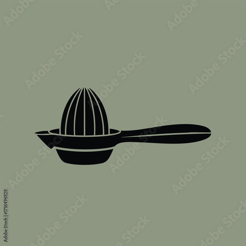 Black silhouette of a manual citrus juicer with a long handle on a muted green background isolated